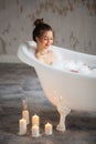 Nice girl enjoying luxurious bath