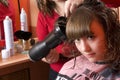 Nice girl in a hairdressing salon