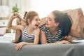 Mother and daughter playing