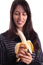 Nice girl looking a banana Royalty Free Stock Photo