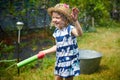 Nice girl playing with water gun Royalty Free Stock Photo