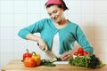 Nice girl preparing to eat. Fresh vegetables. Salad vegetarian.