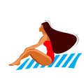 Nice girl in a red swimsuit on the beach. Sits on a blue lounger with white stripes