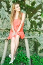 Nice girl sit on the wooden bench Royalty Free Stock Photo