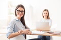 Nice girl sitting at the table Royalty Free Stock Photo