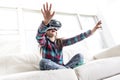 Girl wearing virtual reality goggles Royalty Free Stock Photo