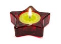 Nice green candle, inside a red star. Royalty Free Stock Photo