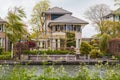 Nice house near water and garden Royalty Free Stock Photo