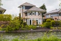 Nice house near water and garden Royalty Free Stock Photo