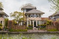 Nice house near water and garden Royalty Free Stock Photo