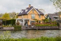 Nice house near water and garden Royalty Free Stock Photo