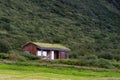 Nice Icelandic house with turf roof and green grass Royalty Free Stock Photo