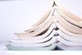 Nice image of a pile of old books on a white background.