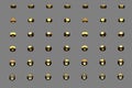 Many yellow, golden female screws rotated by different angles isolated on grey - beautiful industrial 3D illustration, image for Royalty Free Stock Photo