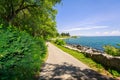 Nice inviting view of outdoor park near the lake shore on sunny summer day