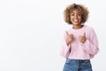 Nice job, cool result. Portrait of friendly-looking delighted attractive joyful african american woman with blond curly