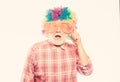 Nice joke. Elderly clown. Man senior bearded cheerful person wear colorful wig and sunglasses. Grandpa always fun