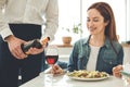 Nice joyful woman looking at the glass Royalty Free Stock Photo