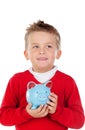 Nice kid with blue moneybox Royalty Free Stock Photo