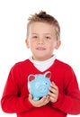 Nice kid with blue moneybox Royalty Free Stock Photo