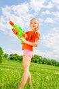 Nice kid girl with a water gun Royalty Free Stock Photo