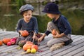 Nice kids paint small Halloween pumpkins