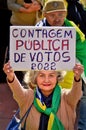 A nice lady with the poster: `Public vote count 2022` at the demonstration for the auditable printed vote on Paulista avenue
