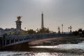 Sunset at the Alexander III bridge over the Seine river and the Eiffel Tower in the background, Paris, France Royalty Free Stock Photo
