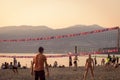 People play volleyball in kitasilano beach vancouver canada