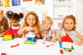 Nice little kids play with plastic blocks Royalty Free Stock Photo