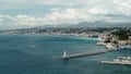 Nice and long coastline with lighthouse, drone shot