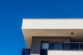 A nice looking architectural corner perspective shoot from a modern building - clear blue sky as background Royalty Free Stock Photo