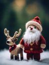 The nice lovely Santa Claus and little deer made of knitting threads. A template for a New Year\'s card.