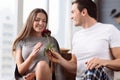 Nice loving boyfriend presenting a rose