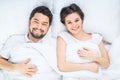 Nice loving couple lying in bed Royalty Free Stock Photo