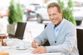 Nice man sitting at the table Royalty Free Stock Photo