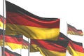 Nice many Germany flags are waving isolated on white - any holiday flag 3d illustration