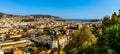 Nice metropolitan view with Colline du Chateau Castle Hill, Mont Boron Mountain, Vielle Ville, Riquier and Port district in France Royalty Free Stock Photo