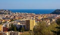 Nice metropolitan view with Colline du Chateau Castle Hill, Mont Boron Mountain, Vielle Ville, Riquier and Port district in France Royalty Free Stock Photo