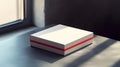 a nice and minimalistic paper square gift box with a red stripe on the sied Royalty Free Stock Photo