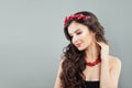 Nice model woman with long brown hair and coral jewelry Royalty Free Stock Photo