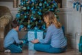 Family scene mom  and kid , Christmas time Royalty Free Stock Photo