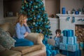 Family scene mom  and kid , Christmas time Royalty Free Stock Photo