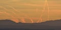 Nice mountain landscape at sunset with some condensation trails