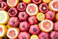 Nice natural background with pomegranates, oranges and grapefruits. Many opened fruits at a market in Istanbul, Turkey during