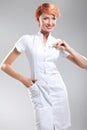 Nice nurse showing pills Royalty Free Stock Photo