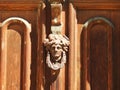 Beautiful old woman face on door, Poland Royalty Free Stock Photo