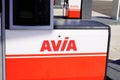 Avia logo text and brand sign on petrol pump nozzles on a gas service station