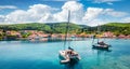 Nice panoramic view of Fiskardo port. Picturesque spring seascape of Ionian Sea. Colorful morning scene of Kefalonia island, Greec