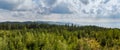 Nice panoramic view to summer czech forest with trees and distant hill, Sumava national park